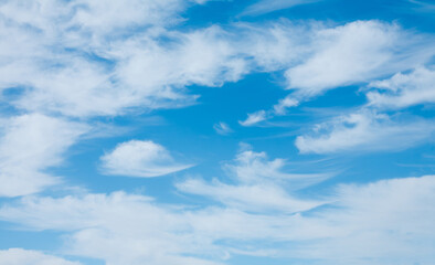Blue sky with soft white clouds in windy weather