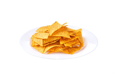 mexican nachos chips on a ceramic plate isolated on a white background.