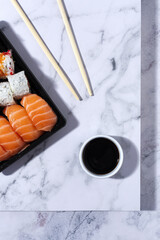 Japanese food concept to go. Sushi take away assortment