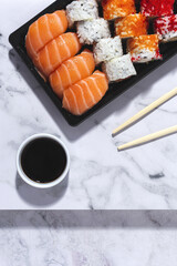 Japanese food concept to go. Sushi take away assortment