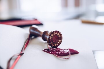 Notary public wax stamp. Wax seal on document.