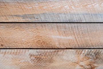 Obraz premium A photograph of decorative rough wood wall boards