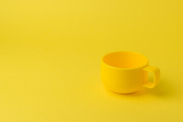 Bright yellow circle on a bright yellow background.