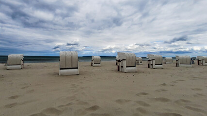 Empty beach with beach chairs