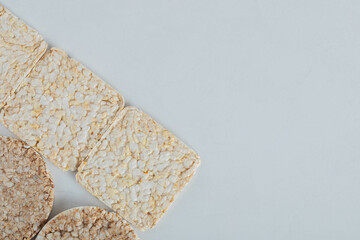Two types of crispbread on white background