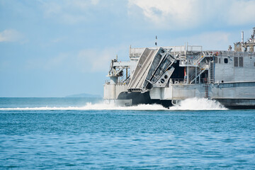 Battleship sailing in the sea, US Navy Spearhead-class expeditionary fast transport ship USNS