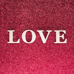 Fototapeta na wymiar Flat lay of love concept on bright glitter sparkle backround.