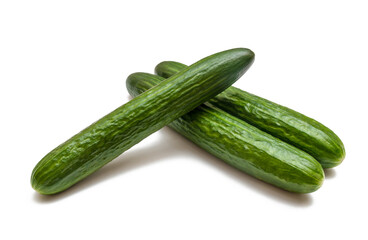 Lots of cucumbers isolated on a white background. Green vegetables for salad and food.