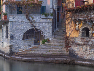 steep stone staircase that climbs up through the colorful houses and characterizes the village of...