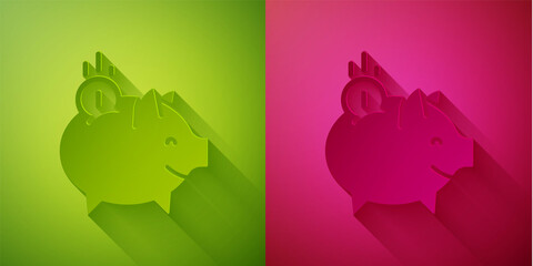 Paper cut Piggy bank with coin icon isolated on green and pink background. Icon saving or accumulation of money, investment. Paper art style. Vector.
