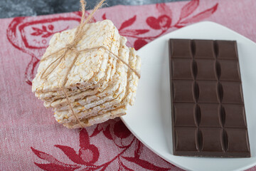 Bar of delicious chocolate with crispy rice bread