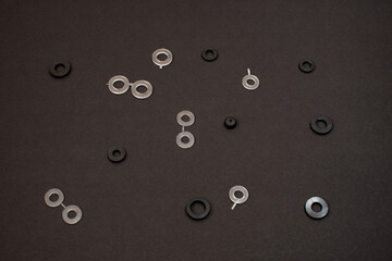 Rubber seals gaskets of round shape on a black background