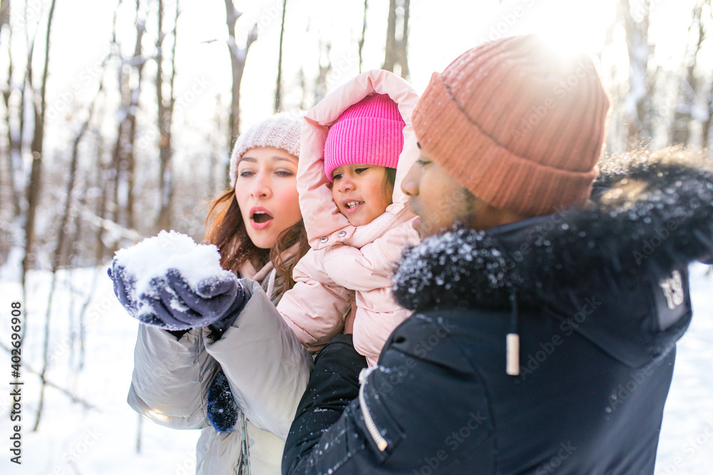 Wall mural happiness excited people in warm clothing in winter outdoors