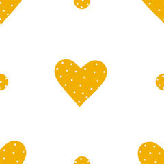 Seamless pattern with yellow polka dot hearts for trendy prints for Valentine's Day. Template for festive paper, textiles, bed linen. Vector illustration.