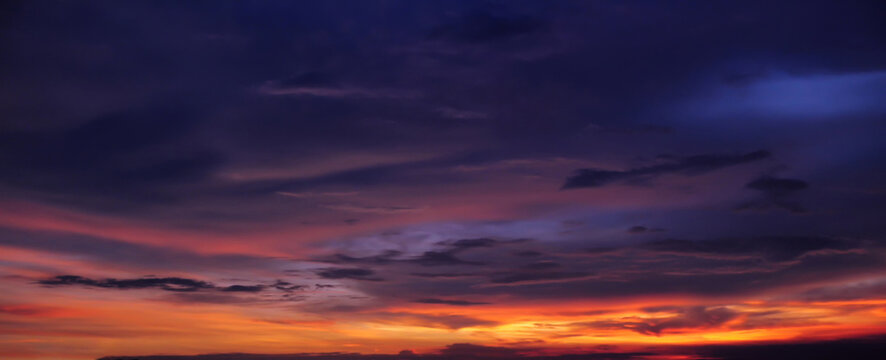 Fototapeta Dramatic tropical sunset sky panorama.