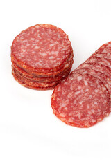 Sliced salami on white background