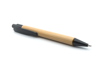 Closeup of wooden bamboo pen on white background