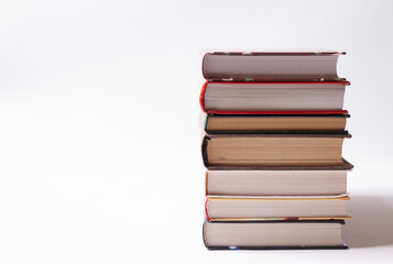 A stack of books. On a white background with place for text.