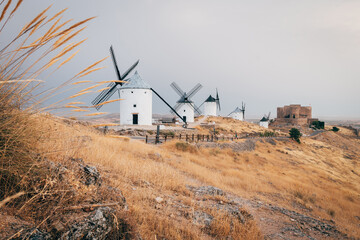 traditional spanish windmills at consuegra, Spain - obrazy, fototapety, plakaty