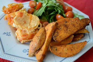 sweet potatoes cheese fries and salad