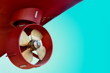 Close up a propeller ship isolated on blue background.