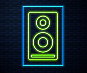Glowing neon line Stereo speaker icon isolated on brick wall background. Sound system speakers. Music icon. Musical column speaker bass equipment. Vector.