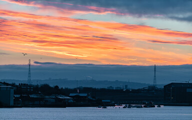 Fototapeta na wymiar Sunset looking up the River Tyne. North East England, UK.