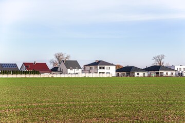 Fototapeta na wymiar new houses in rural areas, rural landscape