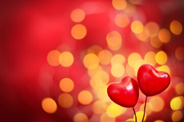 Fototapeta premium Red hearts on a red background. Romantic Valentine's day cards, invitations or posters. Space for text.