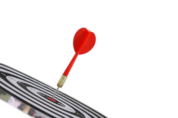 Red darts arrows hit in the target center of dartboard isolated on white background, business goal...