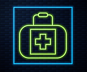 Glowing neon line First aid kit icon isolated on brick wall background. Medical box with cross. Medical equipment for emergency. Healthcare concept. Vector.