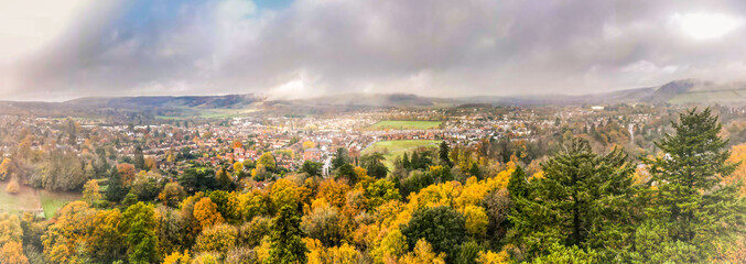 Panoramic view of beautiful English market town in autumnal countryside