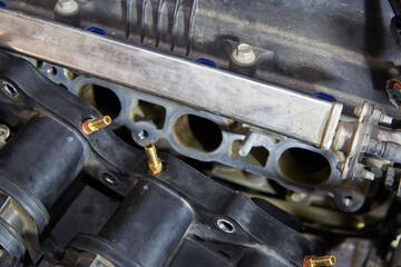 Car engine, intake manifold, connection of LPG injectors.