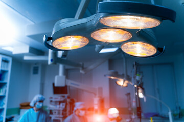 Surgical lamps with four lamps in operating room. Modern equipment for surgery in up to date clinic. Modern interior of surgery room.