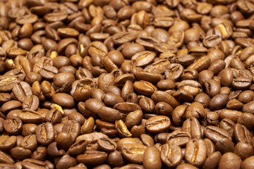 Roasted coffee beans as a background. Kitchen concept.