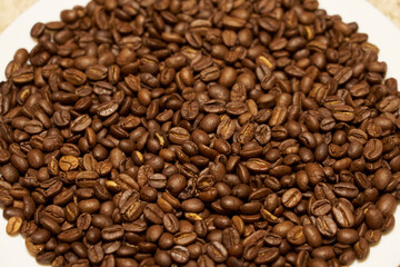 Roasted coffee beans as a background. Kitchen concept.