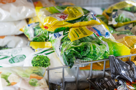 Frozen vegetables in bags in the store. Close-up. Moscow, Russia, 01-01-2021.