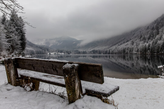 snow covered bench in the mountains, Langbathsee, Austria
