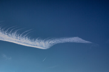 Cirrus cloud in blue sky with copy space