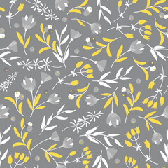 Cute abstract seamless pattern with small yellow flowers on the gray background.Summer floral vector illustrationwith tiny leaves.