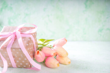 Tulips bouquet with gift