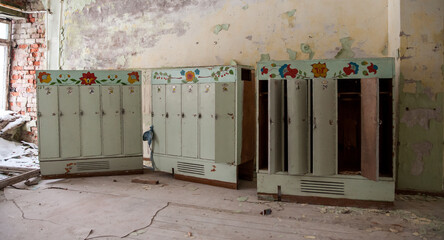 Empty kindergarten room in former military base abandoned after regime collapse