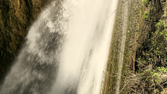 Tanur or Oven Waterfall (21 m) in Ayoun Nature Reserve, by the town of Metula, Upper Galilee, Israel. 4K