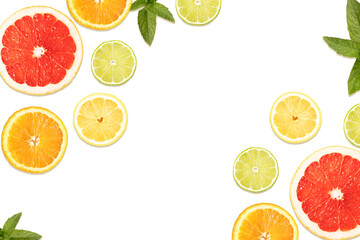 Round citrus slices on a white background diagonally with space for text. Template, layout of your advertisement.