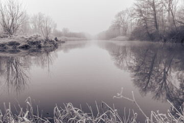 Lake in mist in black and white