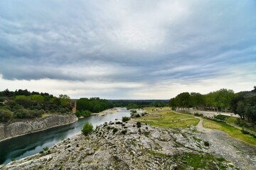 landscape with river and blue sky, photo as a background , in Pont du gard, gardon, nimes france