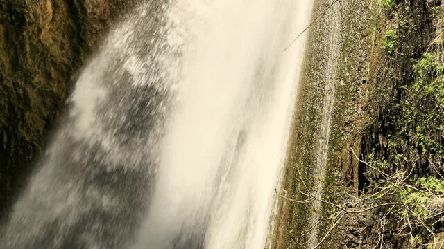 Tanur or Oven Waterfall (21 m) in Ayoun Nature Reserve, by the town of Metula, Upper Galilee, Israel. 4K
