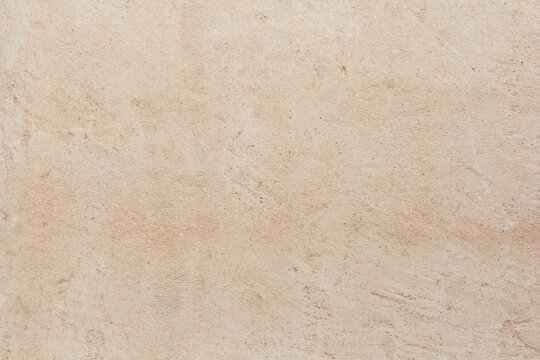 Full frame of weathered plastered wall background texture