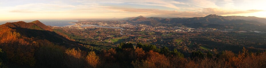 View from Txingudi bay with the mouth of Bidasoa river between Irun, Hondarribia and Hendaia at the Basque Country.	

