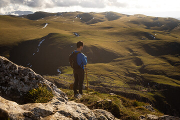 Fototapeta premium Mountain hiker on the top of the Txindoki peak at the Basque Country.